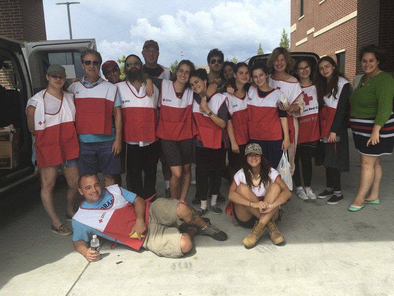 16-member North Shore volunteer team in Red Cross vests in Baton Rouge