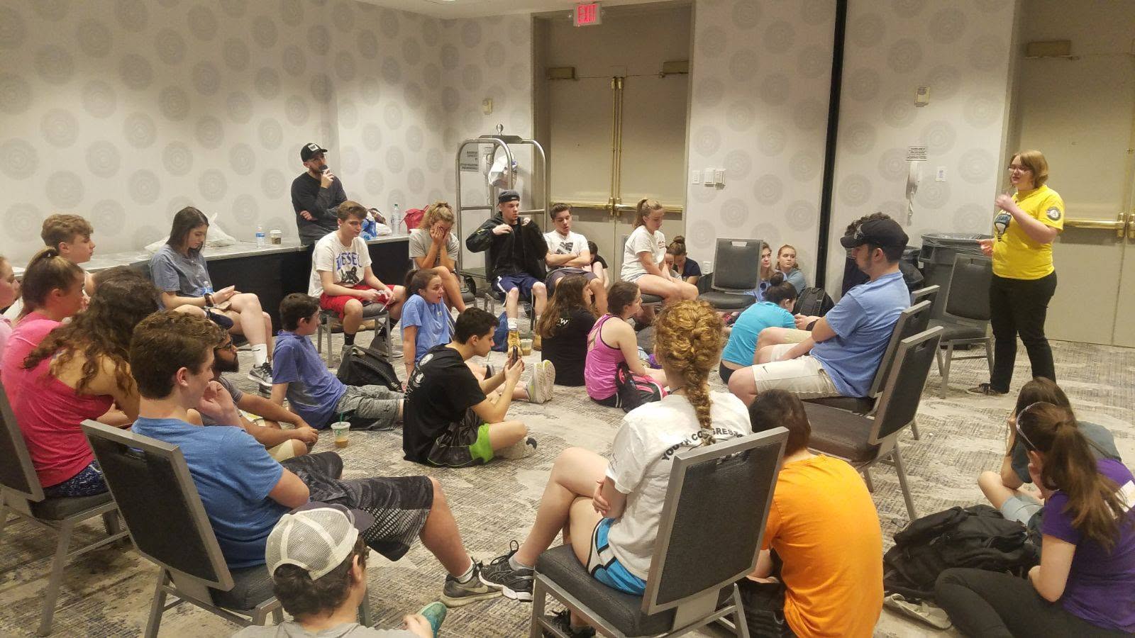 Evening reflection circle in Houston as Rabbi Yossi and North Shore teens debrief on the day’s rebuilding work and the meaning of giving.