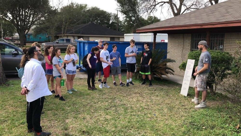 Rabbi Yossi Lipsker morning briefing on a Houston lawn