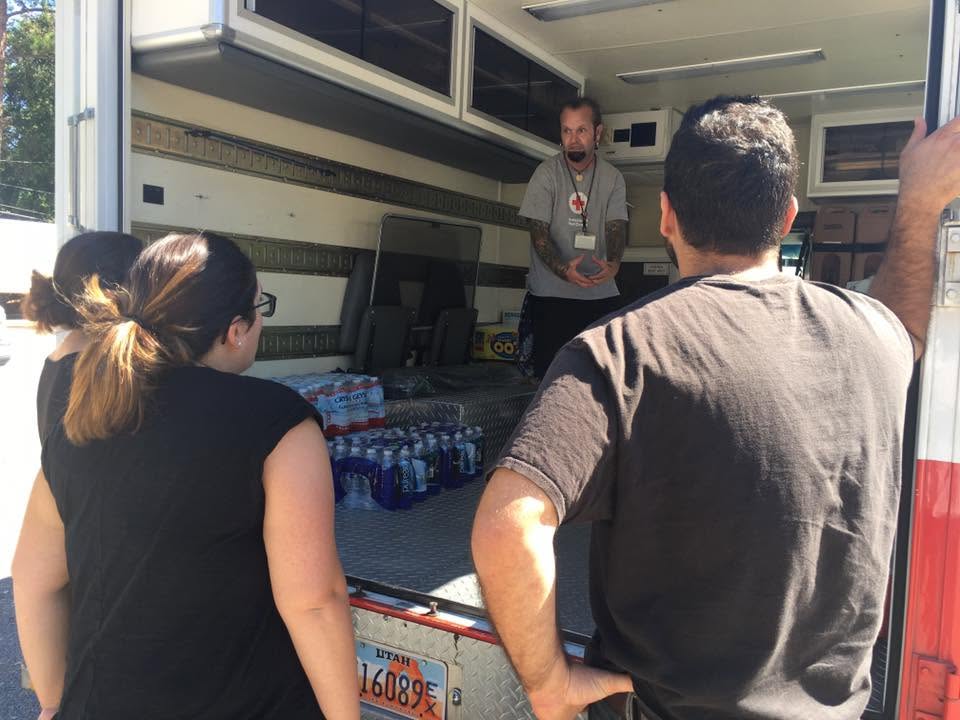 Loading water and meals inside Red Cross truck